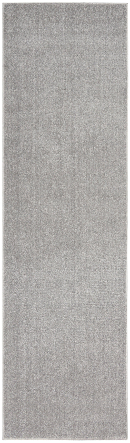 Long grey outdoor rug runner with a soft textured weave in light silver-gray.
