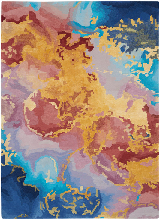Abstract multicolor area rug in warm yellows, pinks, purples and blues with painterly flowing shapes and plush pile.