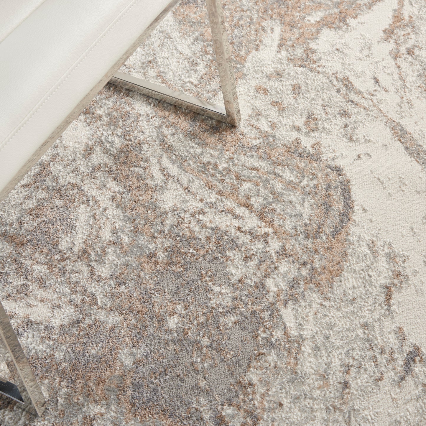 Cream rug with a beige-gray abstract pattern, 4' x 6'.