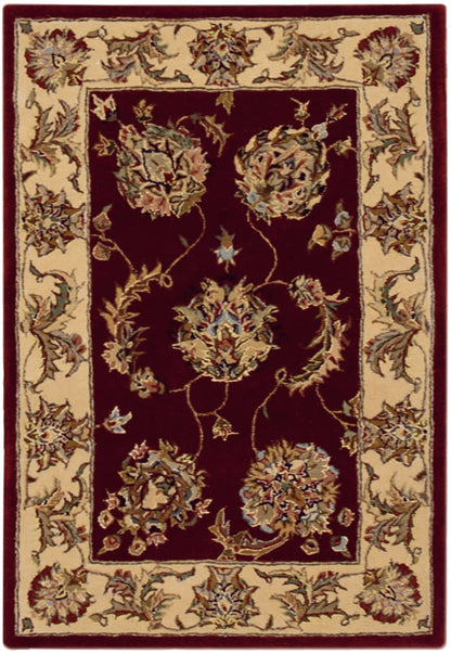 Traditional oriental rug: burgundy central field with ornate floral medallions, cream border and scrolling vine motifs.