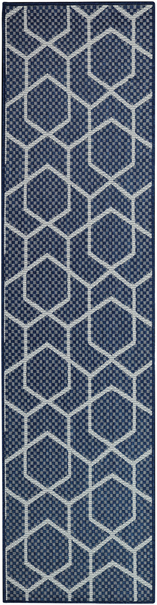 Navy blue runner rug with white geometric hexagon lattice pattern; woven texture, bordered in navy for hallway decor.