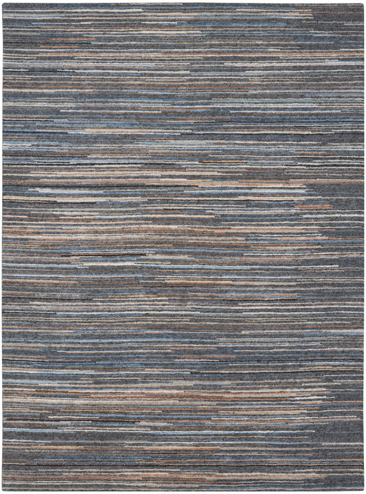 Rectangular rug featuring blue-gray, tan and beige irregular horizontal stripes in a modern abstract pattern.