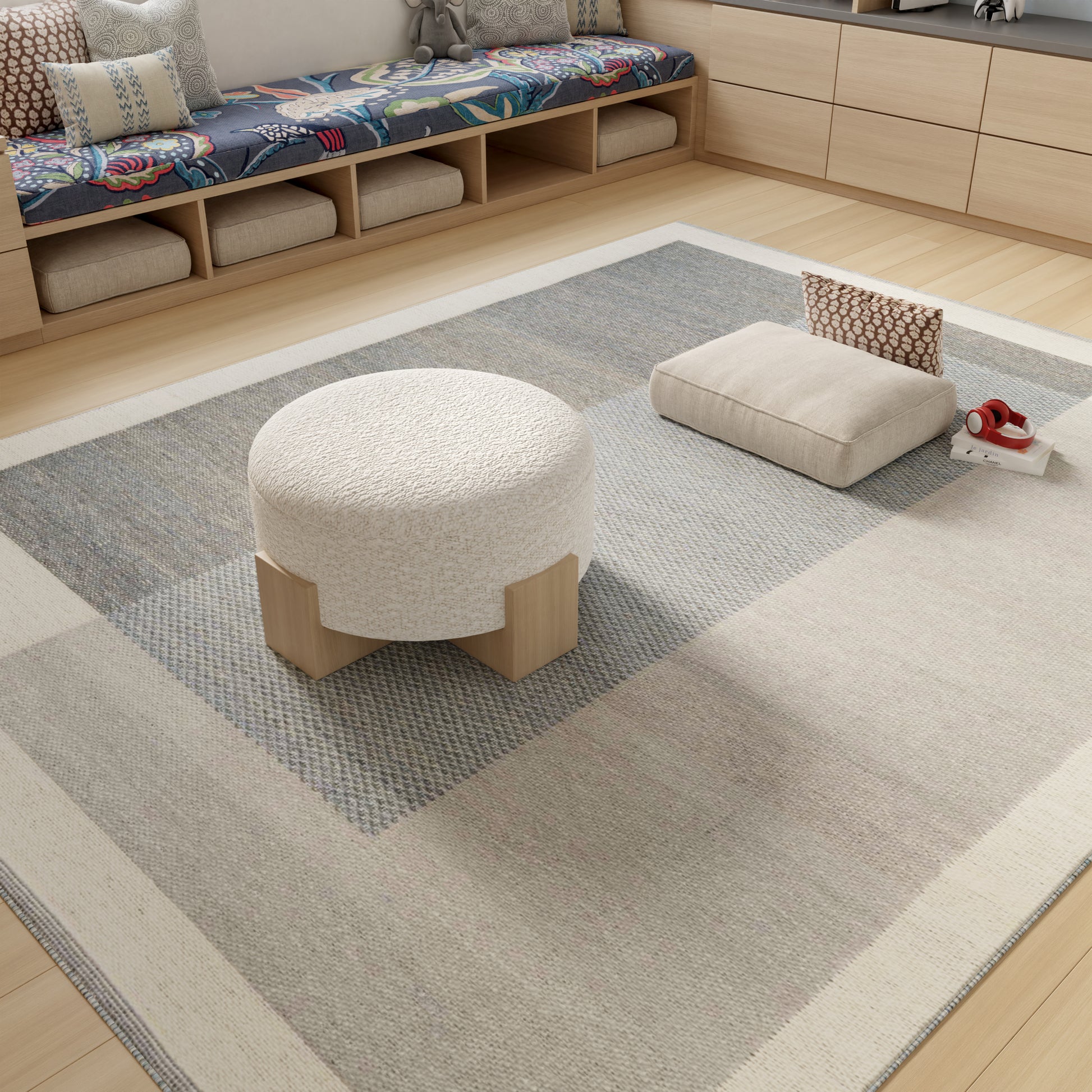 Cream geometric-pattern rug in beige and gray tones.