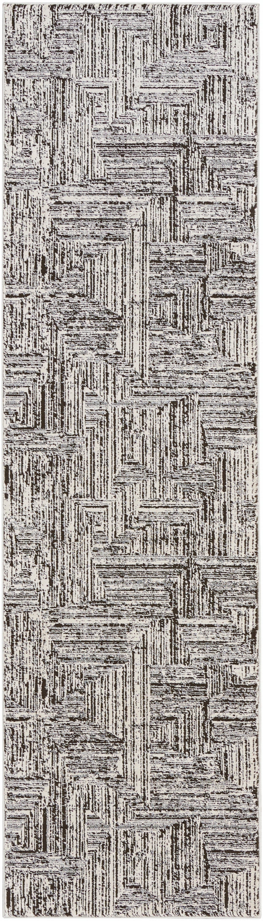 Rectangular woven rug in beige and dark brown with a textured geometric, maze-like pattern.