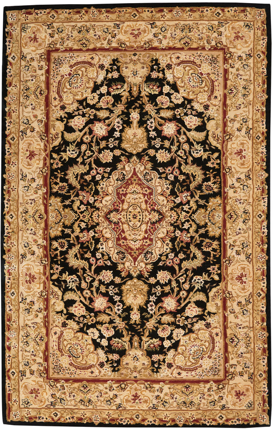 Persian-style oriental rug with black central field, gold floral motifs, red central medallion, beige border, rectangular.