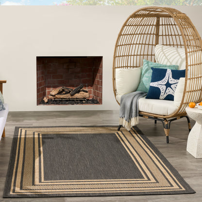 Dark gray and beige striped rug, 6' x 9'.
