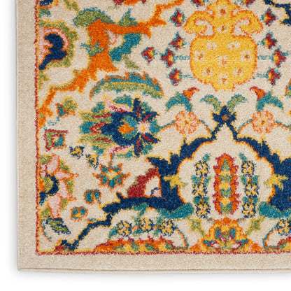 Colorful Bohemian runner rug with cream base and ornate floral border in blue, orange, yellow, teal.