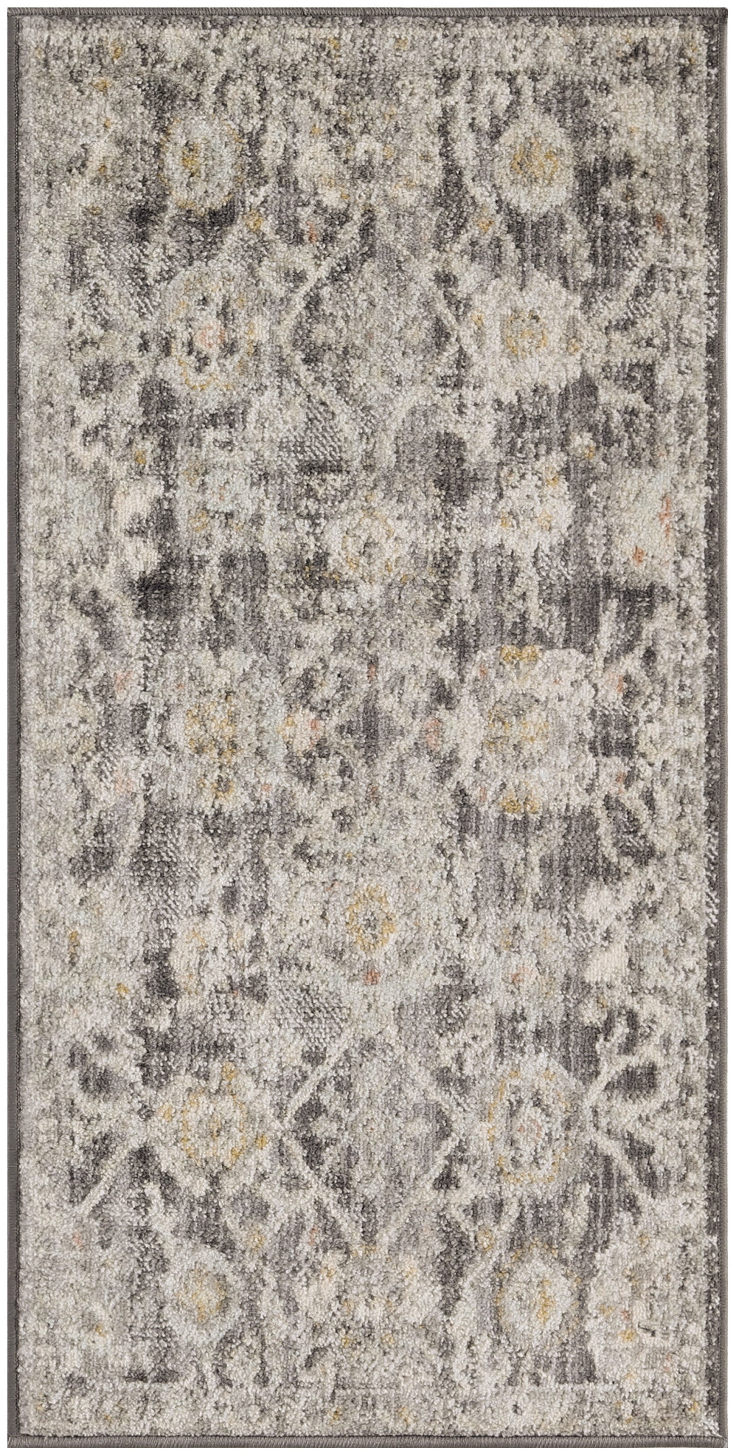 Grey & ivory patterned area rug with subtle floral motifs & yellow accent flecks.