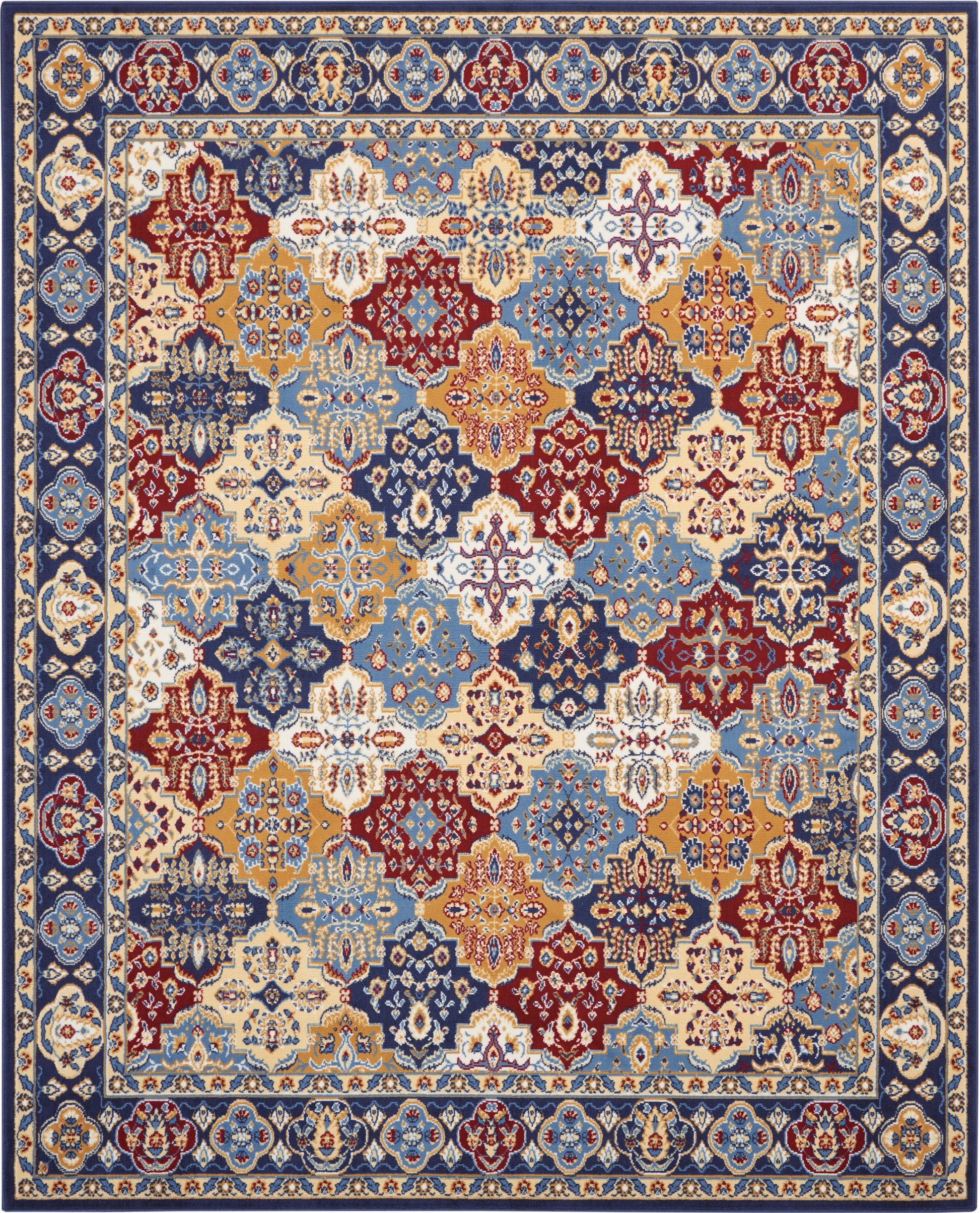 Rectangular oriental rug with a blue-dominant floral lattice in red, gold and ivory, framed by navy borders.
