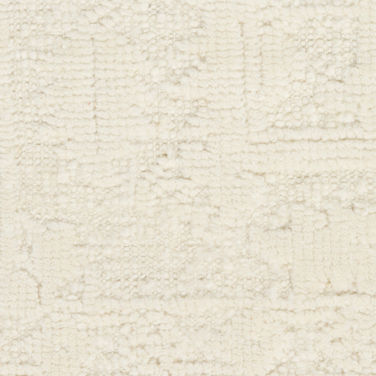 Cream textured rug with a subtle geometric block pattern; plush loop-pile for cozy, neutral decor.