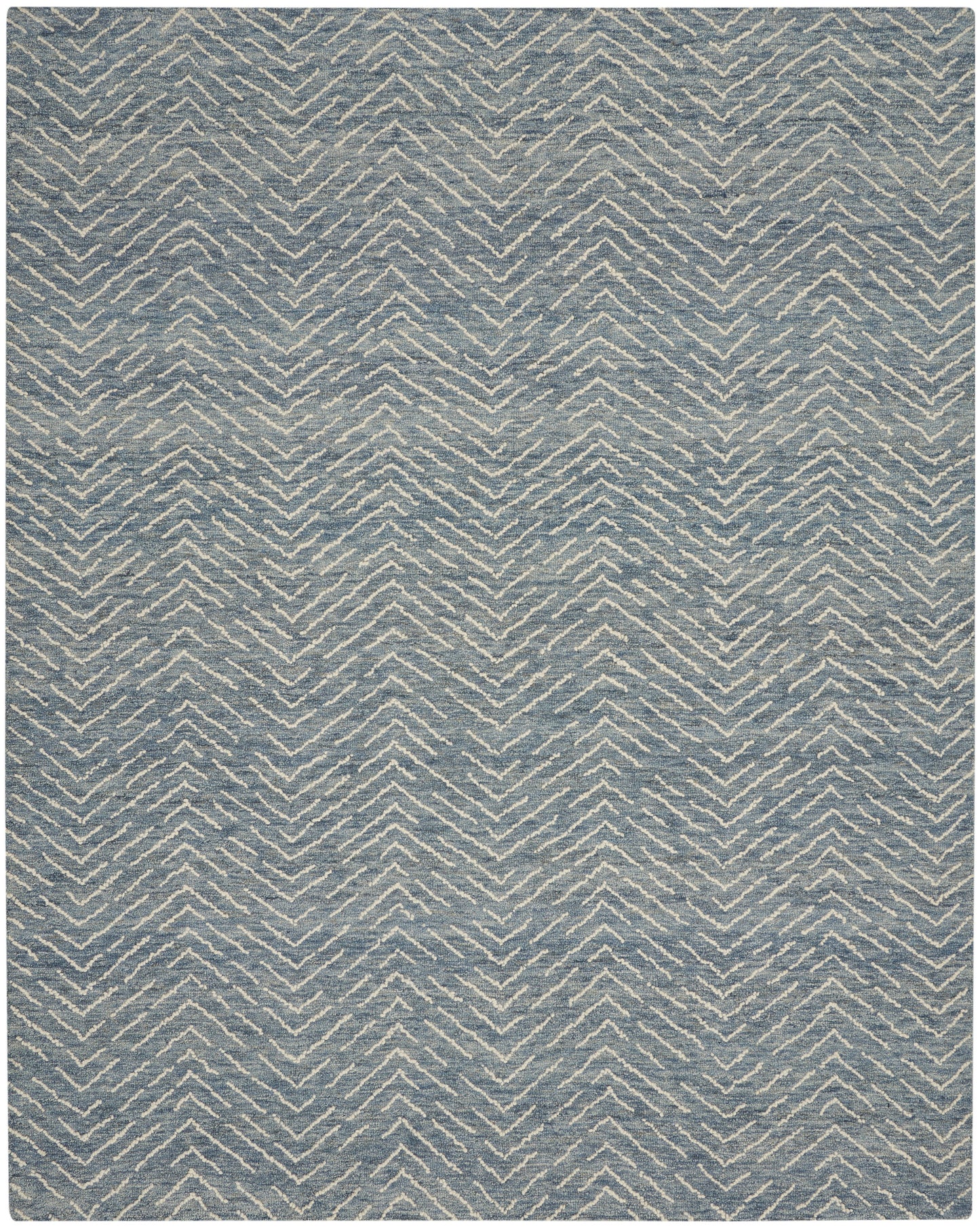 Blue-gray woven rug with a white chevron zigzag pattern and soft textured finish.