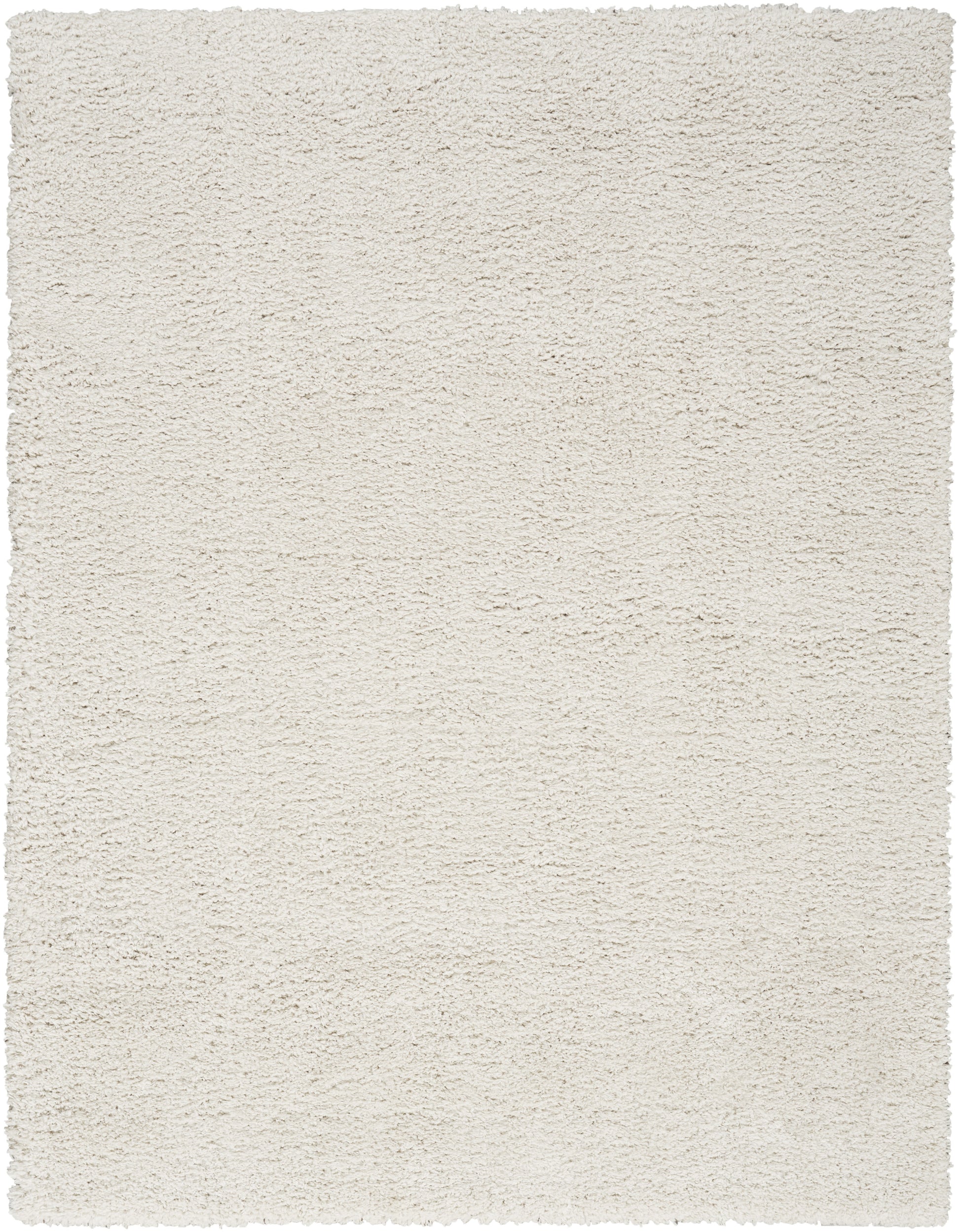 Cream-colored plush shag rug with a soft, high-pile texture; rectangular floor rug for living spaces.