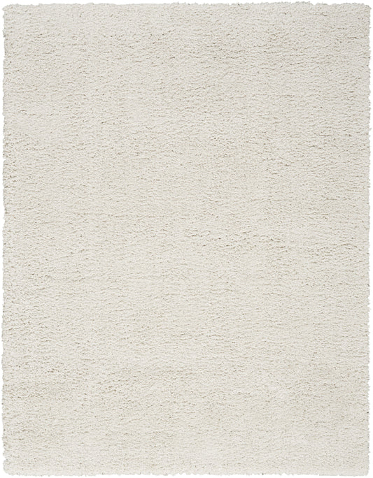 Cream-colored plush shag rug with a soft, high-pile texture; rectangular floor rug for living spaces.