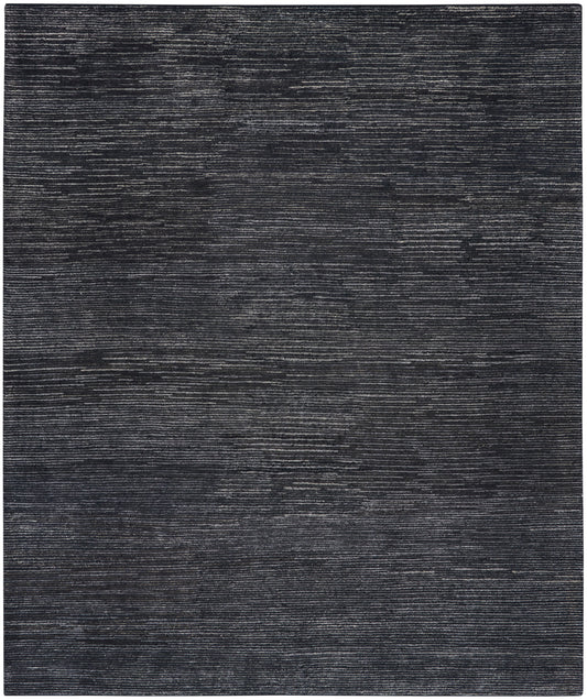 Dark charcoal rectangular rug with subtle horizontal brushed stripes and a soft, textured surface.