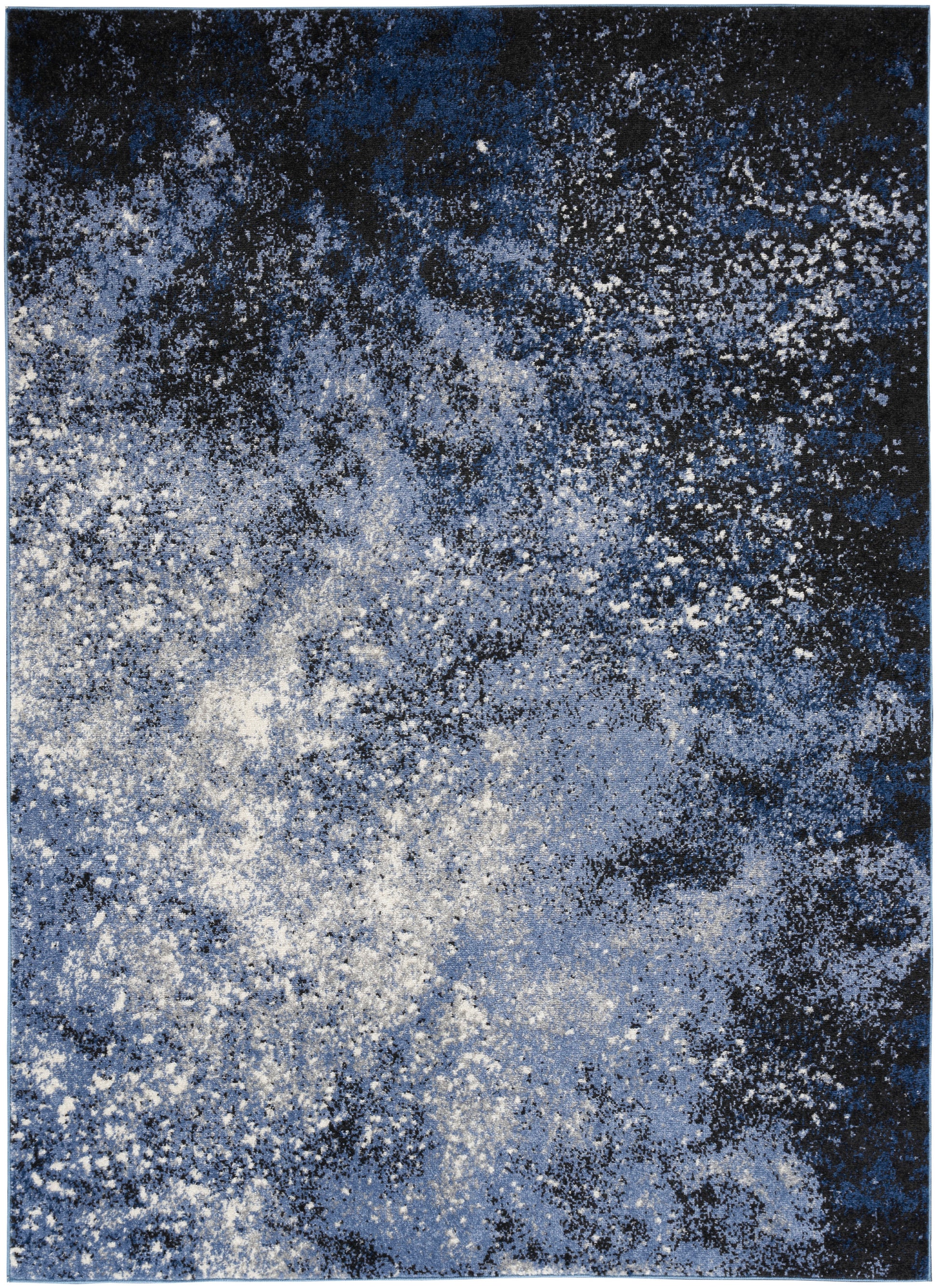 Abstract blue area rug with navy, light blue and white speckled splatter pattern; modern, galaxy-inspired design.