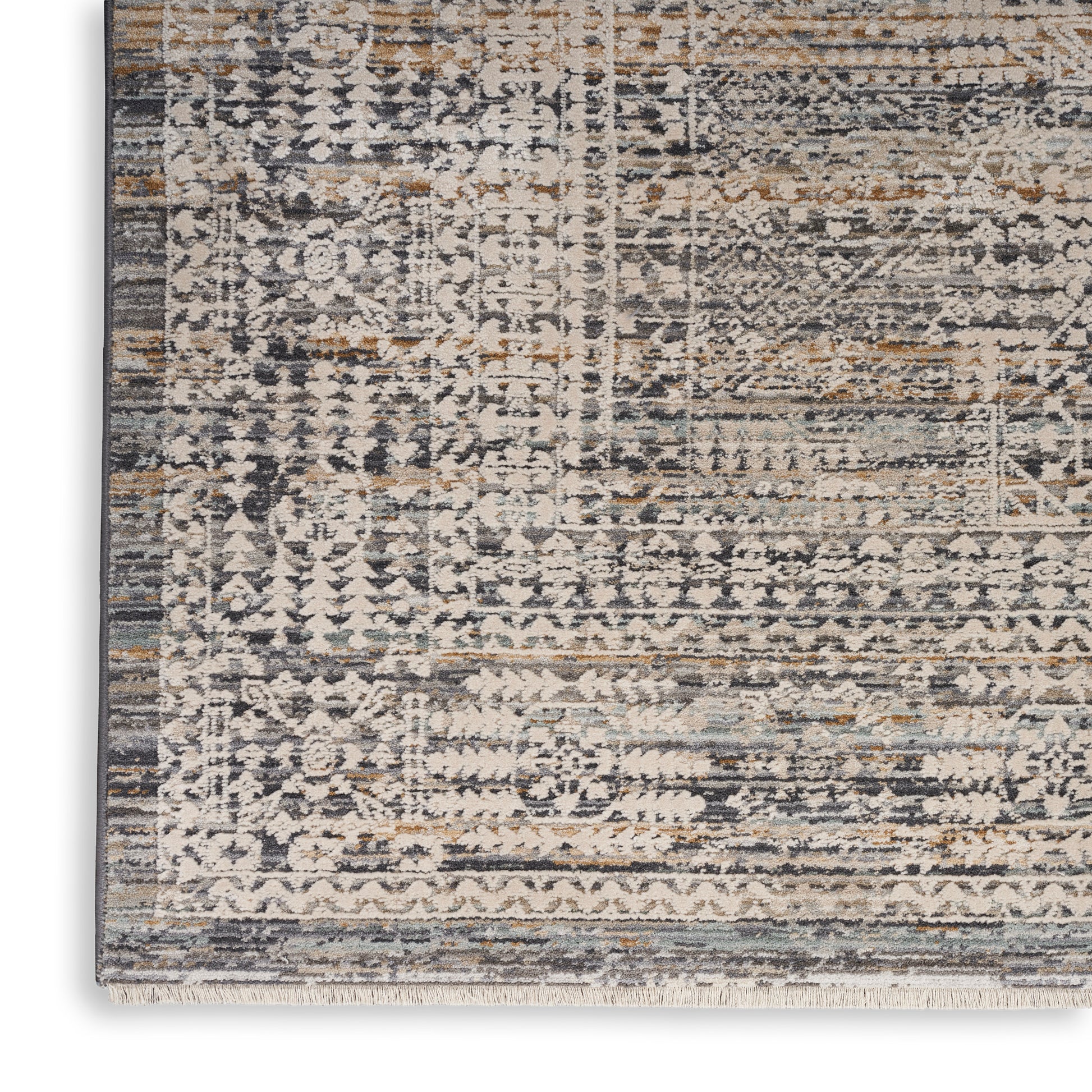 Distressed oriental-style area rug in gray, ivory, taupe and tan with fringe edge and vintage geometric floral pattern
