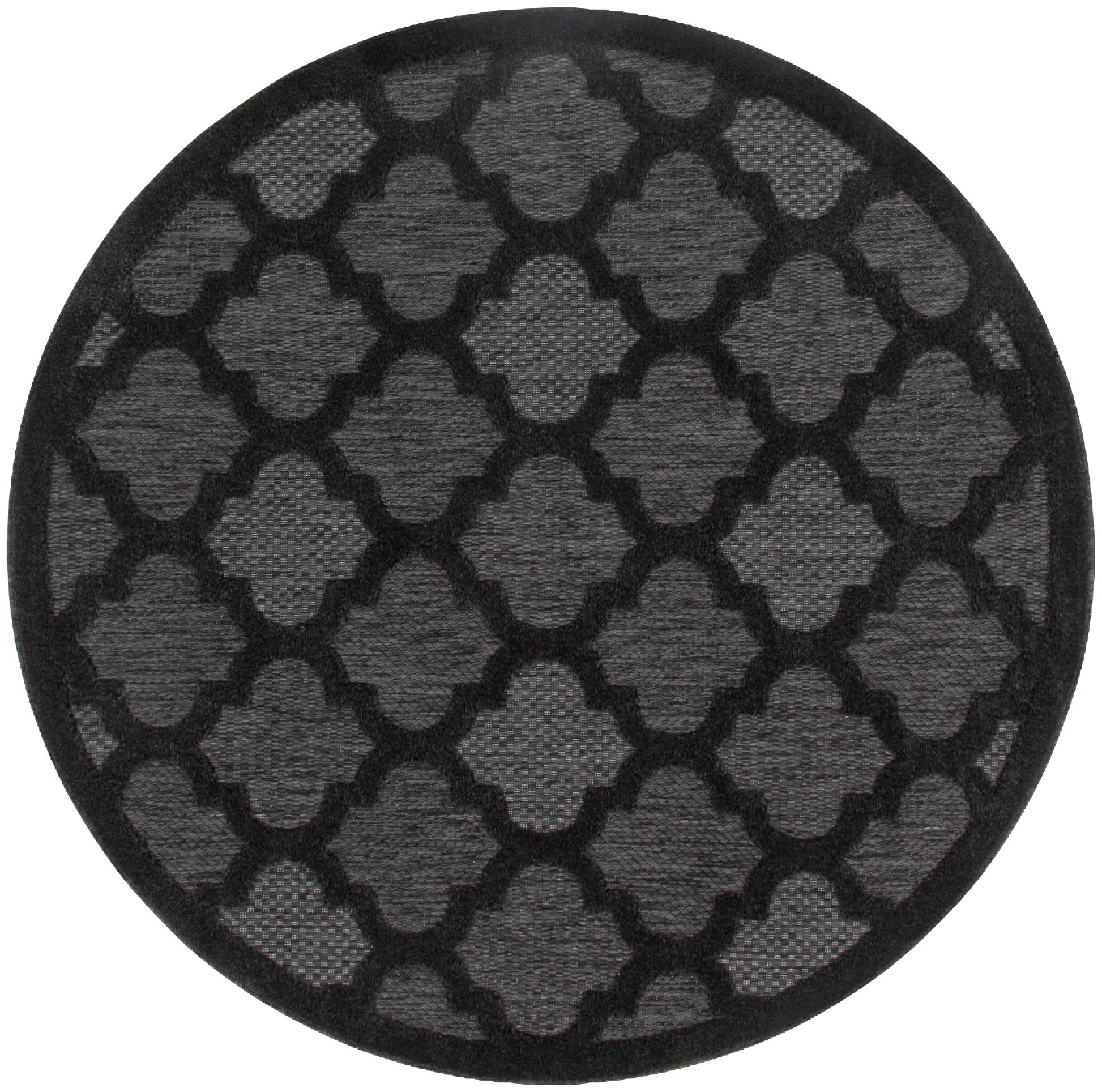 Round black rug, 5 ft diameter, with a repeating quatrefoil lattice pattern and textured surface.