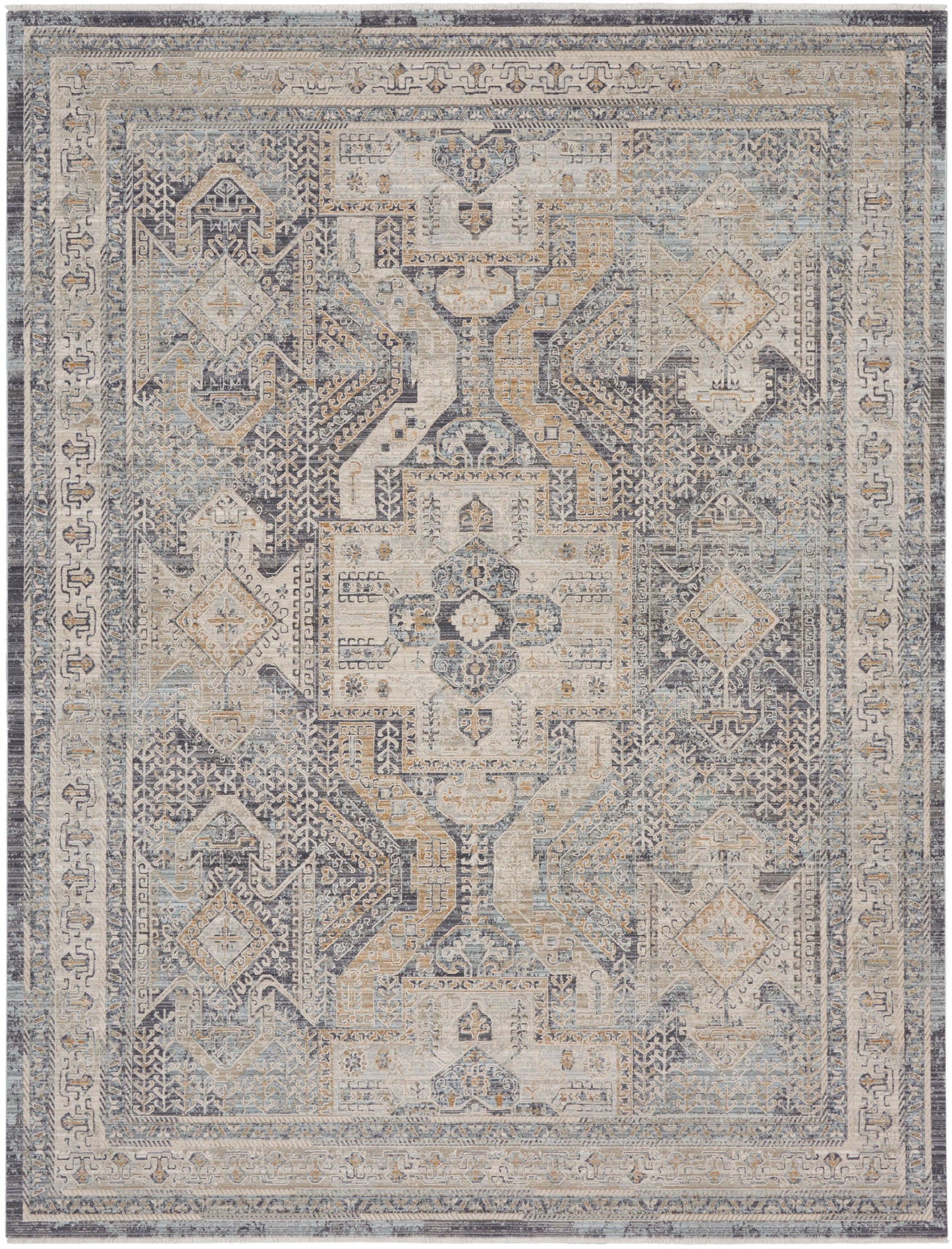Distressed blue-gray oriental area rug with geometric medallions and layered ivory-beige borders.