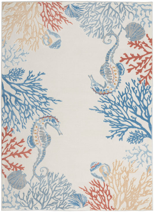Coastal-style area rug featuring seahorses and coral in blue, red and tan on ivory background.