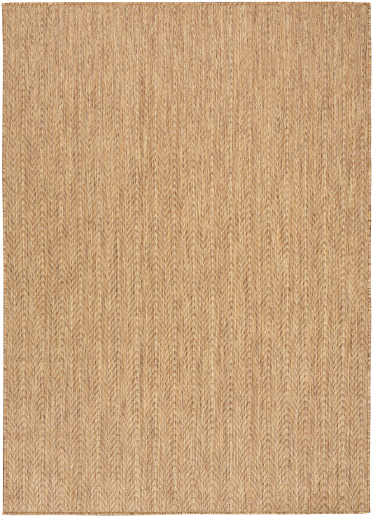 Natural beige woven rug with subtle chevron texture and warm jute-like fibers.