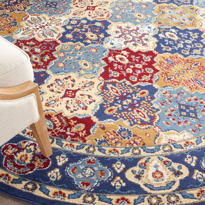 Colorful oriental-style area rug with blue, red, gold, and cream floral medallion patterns; partial light wood chair at edge.