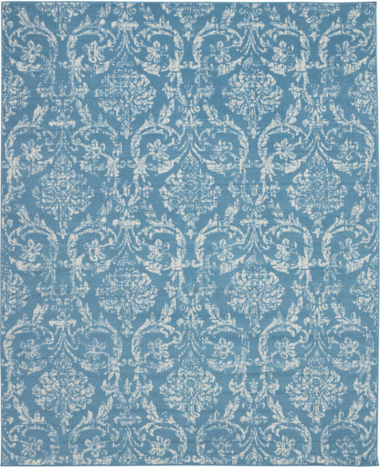 Teal blue rectangular area rug (8' x 10') with a white damask pattern and ornate vintage-inspired floral-scroll motifs for classic décor.