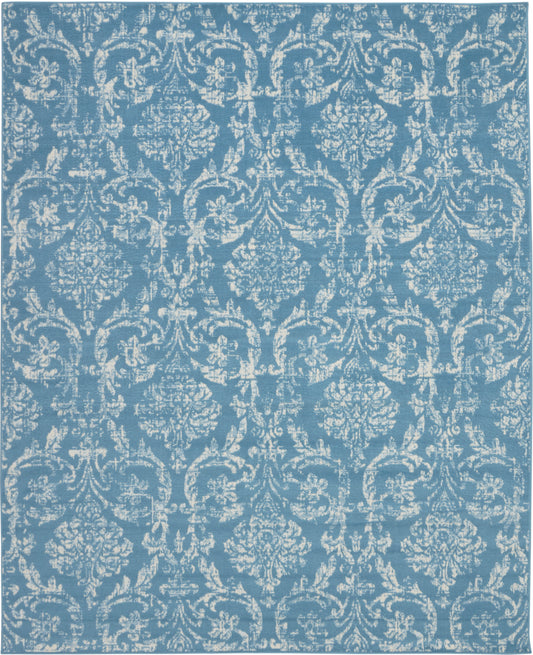 Teal blue rectangular area rug (8' x 10') with a white damask pattern and ornate vintage-inspired floral-scroll motifs for classic décor.