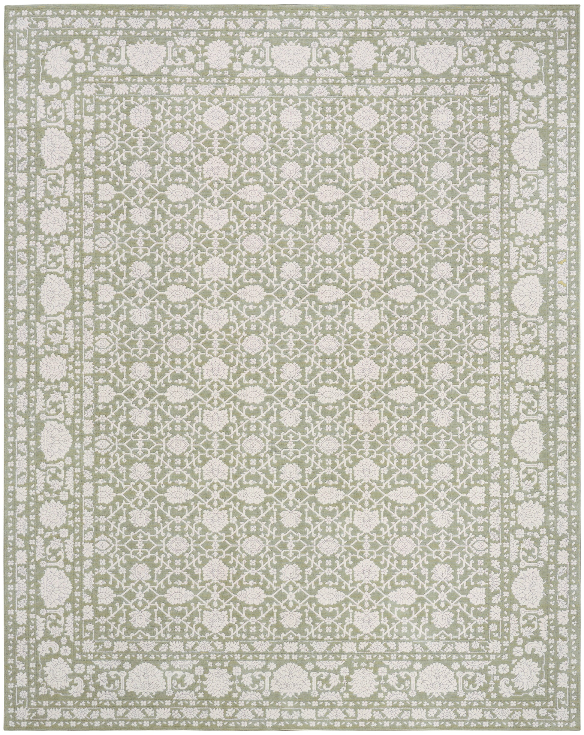 Rectangular rug in pale sage with ivory lattice floral pattern and double bordered edge.