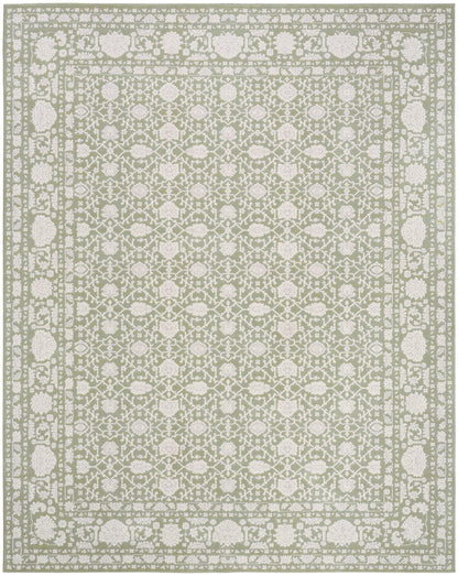 Rectangular rug in pale sage with ivory lattice floral pattern and double bordered edge.