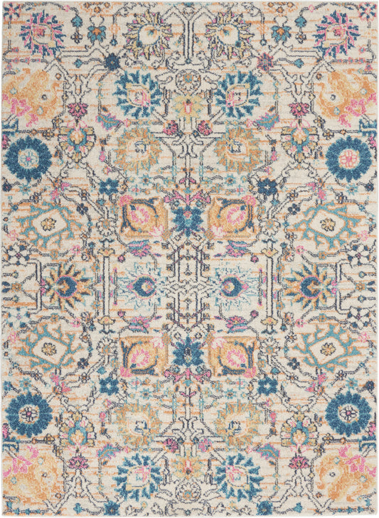 Ornate oriental-style area rug featuring teal, pink and yellow floral medallions on a cream background.