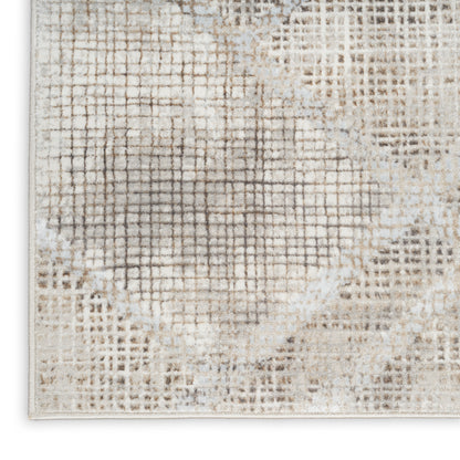 Close-up of a beige-taupe rug runner with a distressed grid pattern and circular motif, woven texture for living room decor.