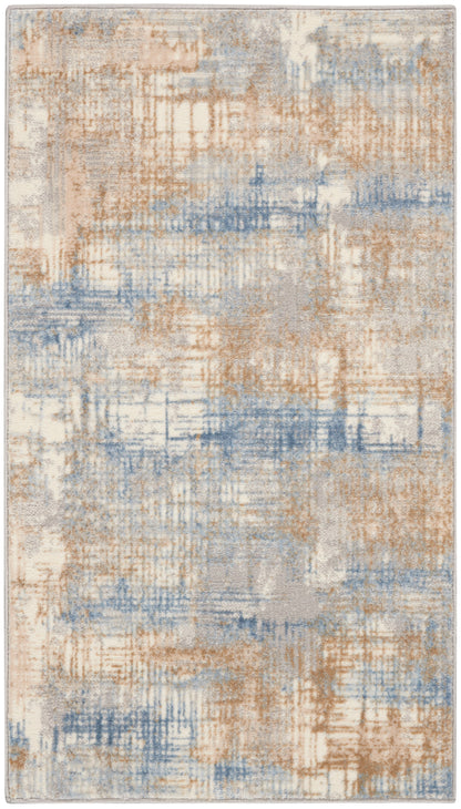 Abstract blue, tan and ivory area rug with a distressed pattern; rectangular, soft pile, modern decor.