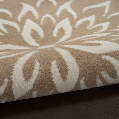 Beige 7' runner rug with a white floral pattern, soft plush pile, rolled edge on dark wood floor.