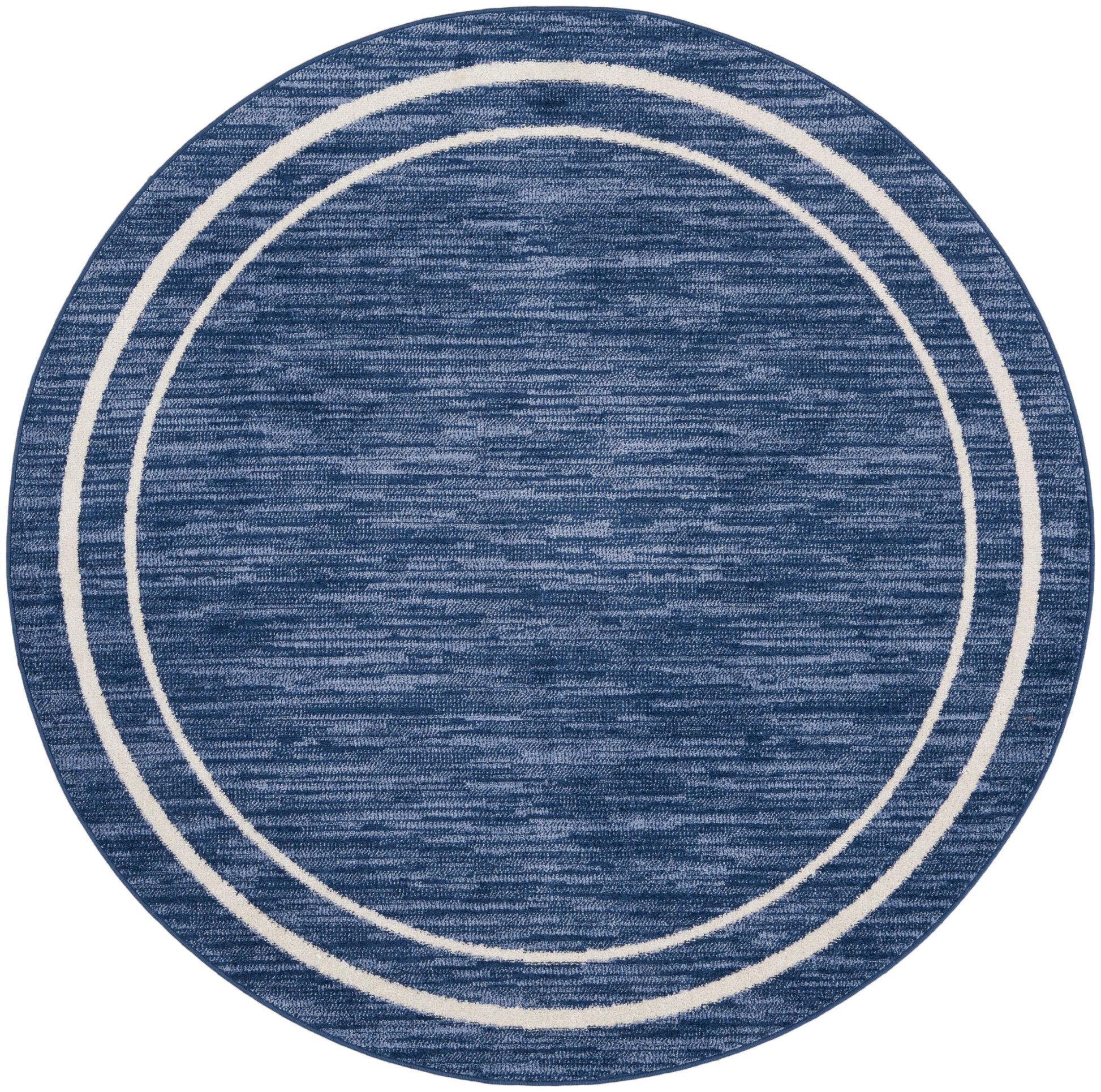 Round blue rug with navy and lighter blue woven texture and white double circular border, modern coastal style.
