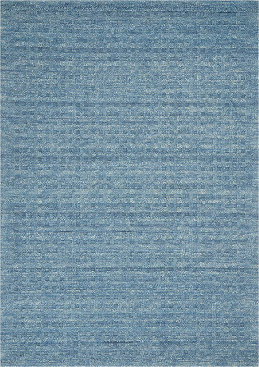 Blue denim-toned rug with a heathered, textured weave; rectangular, perfect for living rooms.