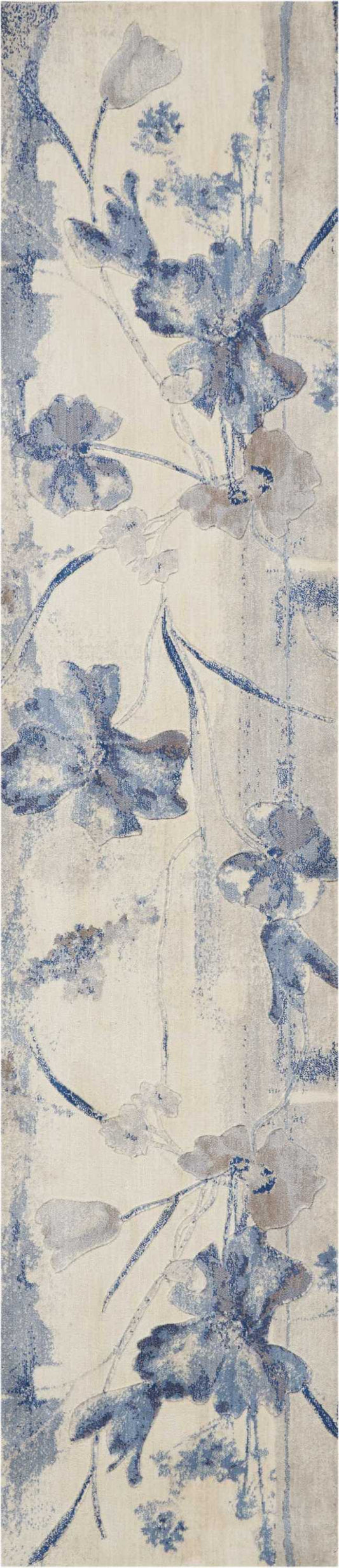Vertical blue floral pattern on a pale beige background; watercolor blossoms and vines on a runner rug.