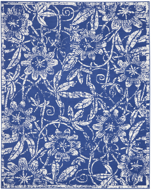 Blue and white floral pattern fabric with vines and blossoms; vintage-style textile for upholstery, curtains, or wallpaper.