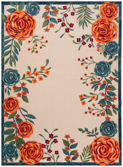 Floral border rug with large orange roses, teal blooms & green leaves framing a beige center and dark teal edge.