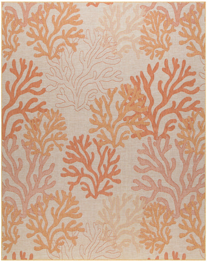 Rectangular woven rug with peach and orange coral reef motifs on a beige background.