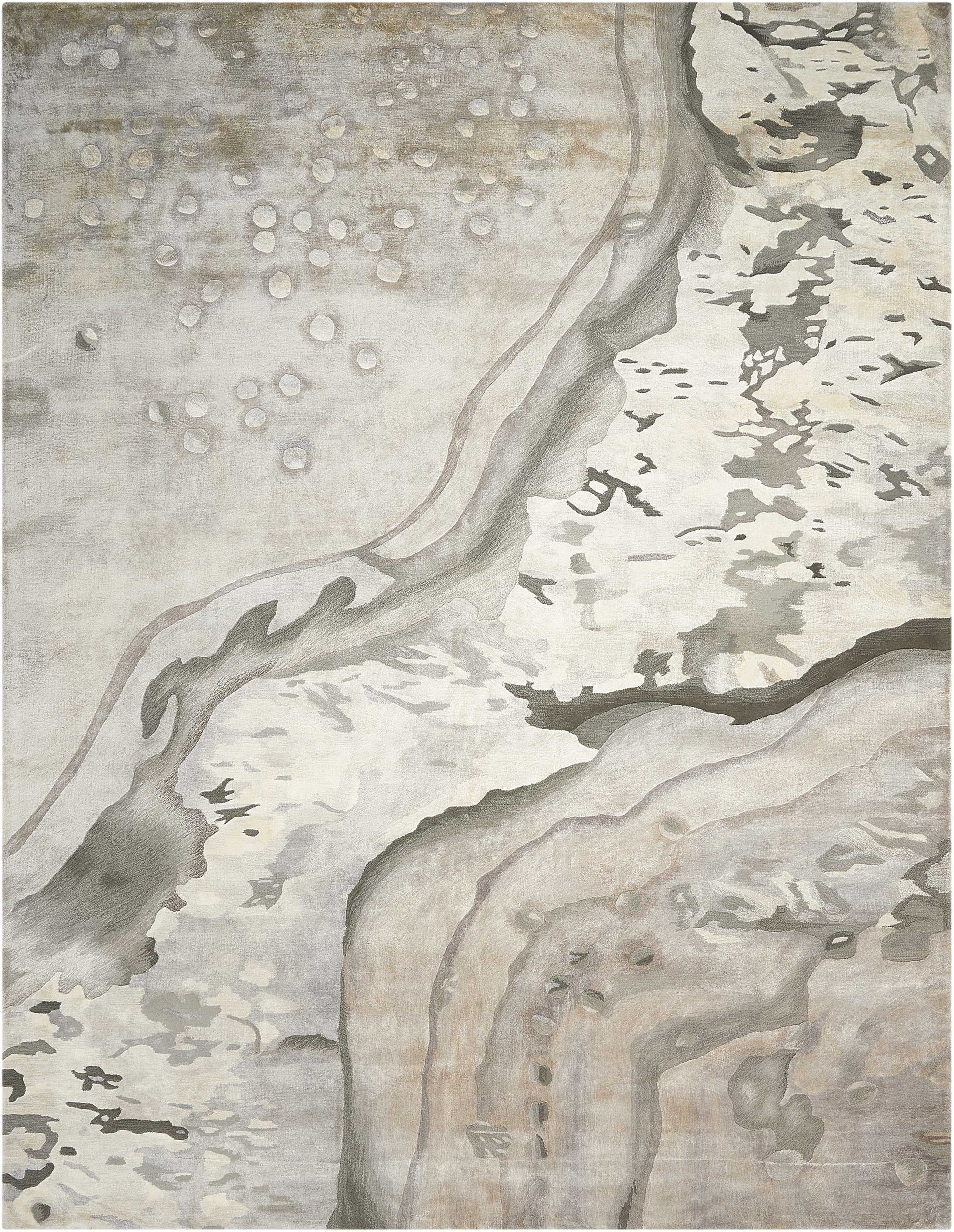 Neutral abstract area rug in ivory, beige and gray with flowing rock-like shapes and subtle watercolor textures.