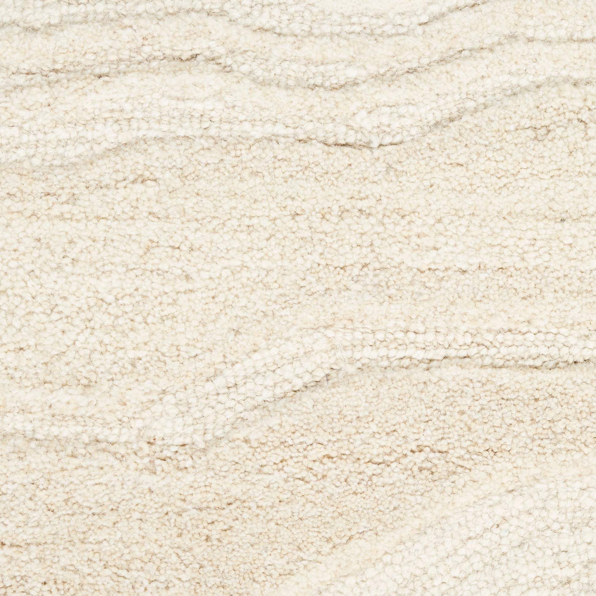 Cream boucle rug with soft looped beige pile and subtle wavy texture.