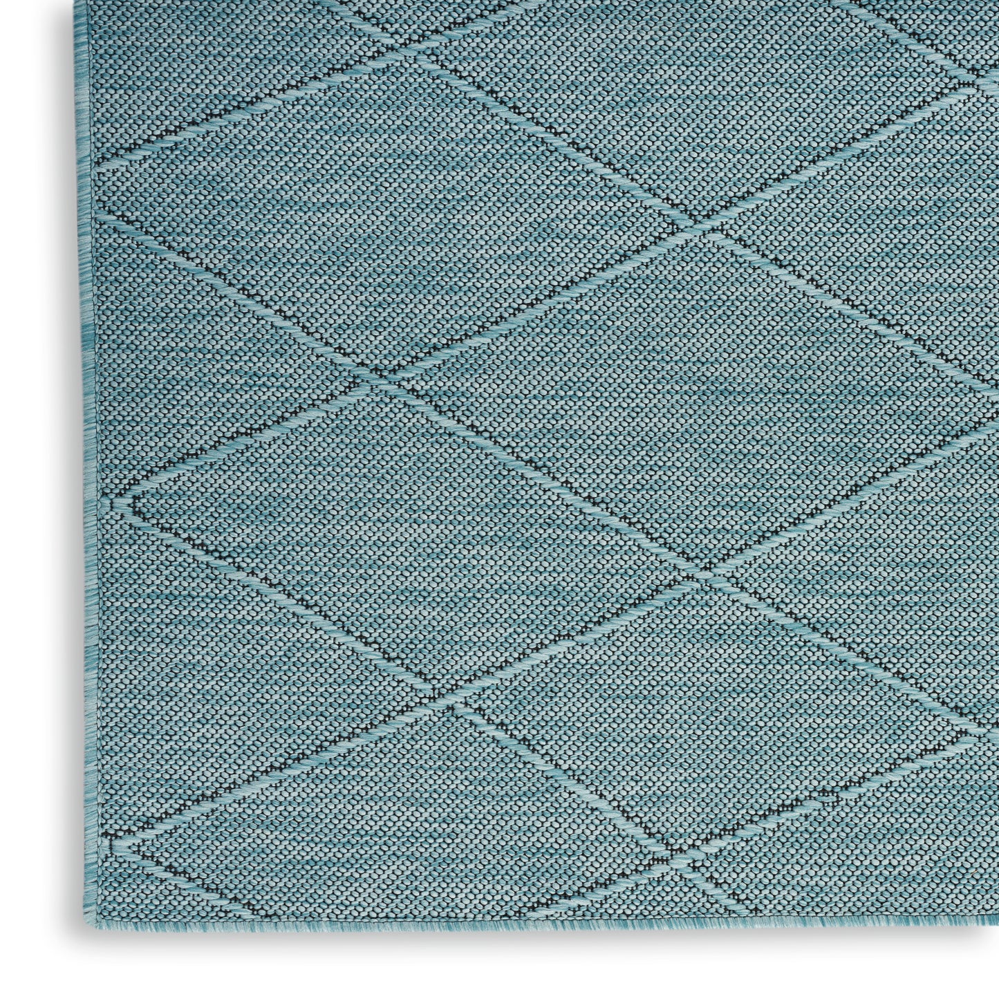 Teal diamond-quilted area rug with textured loop pile and bound edge; diagonal lattice pattern.