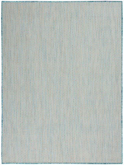Light beige flatwoven rug with a tiny blue diamond lattice pattern and teal border.