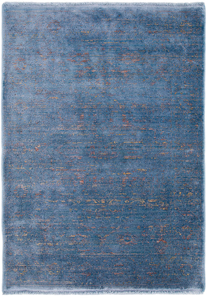 Blue distressed abstract rug with copper specks, plush pile and fringe border.