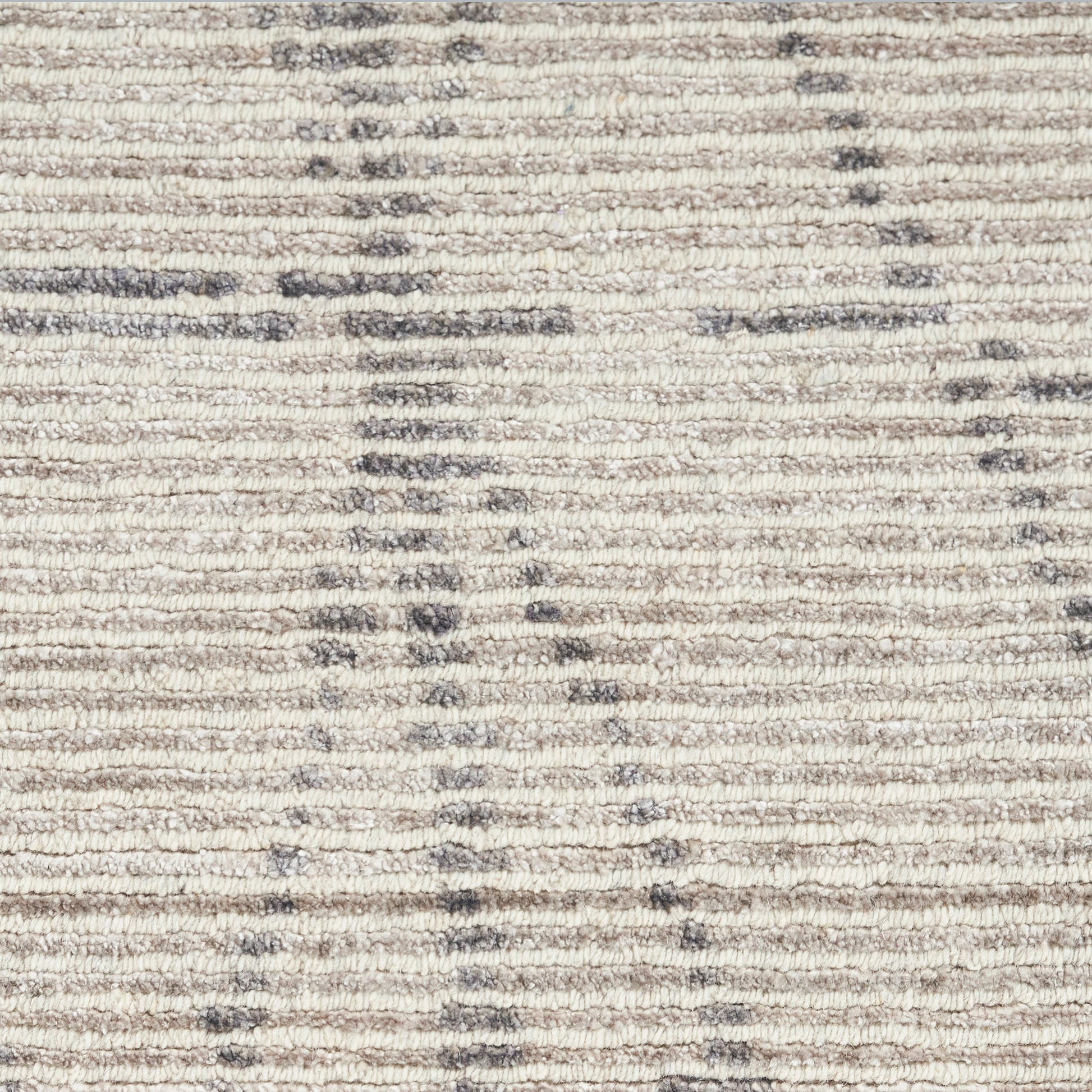 Beige textured rug with subtle gray linear pattern; soft woven, modern decor piece.