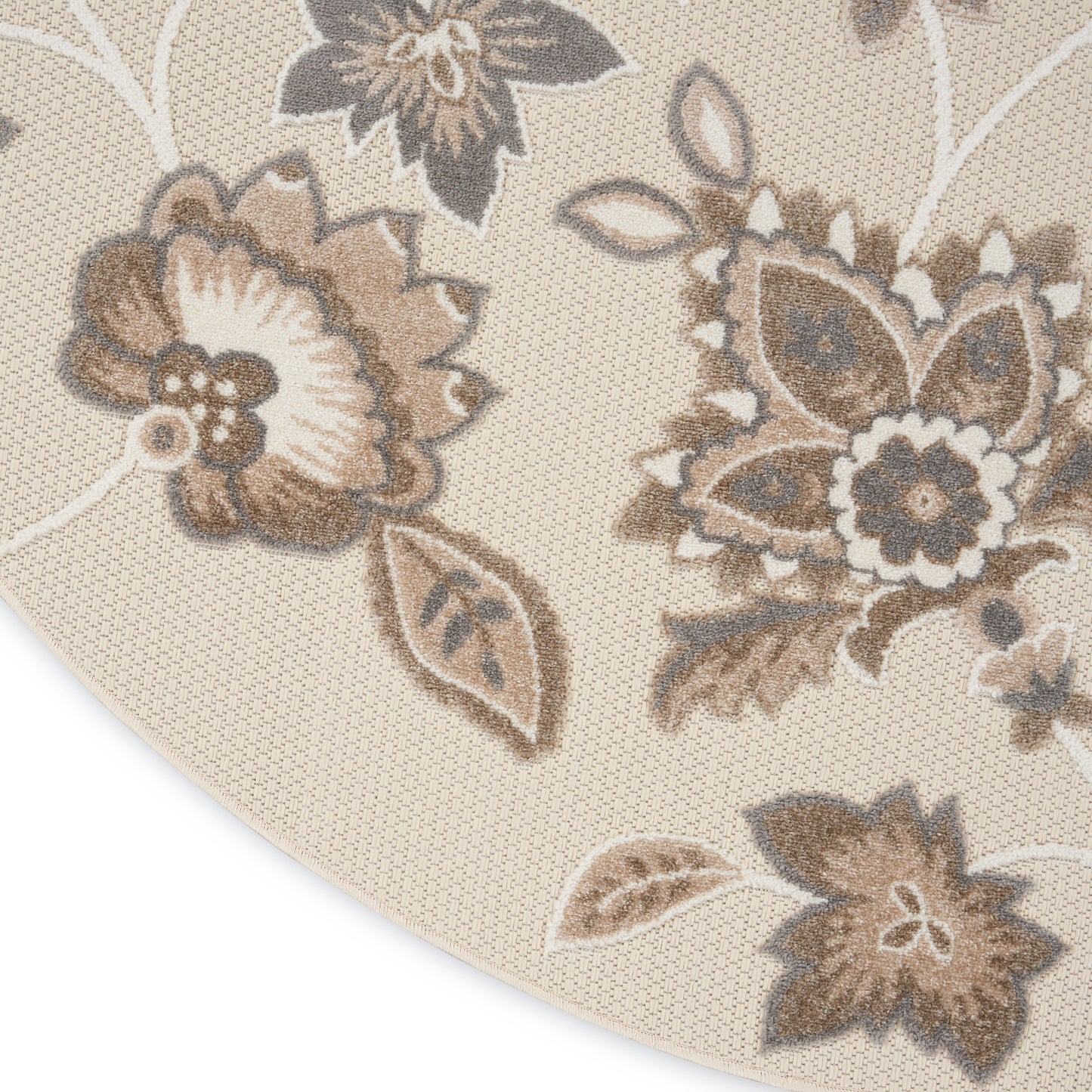 Beige round area rug with taupe-brown floral damask pattern and woven texture.