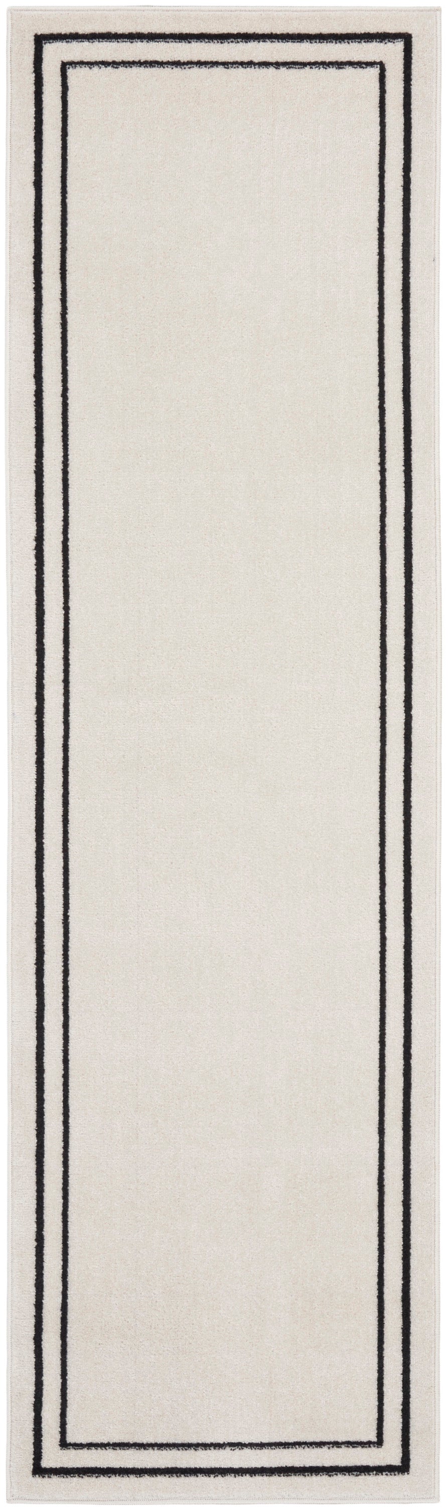 Cream rectangle rug with double black border frames along edges in minimalist style.