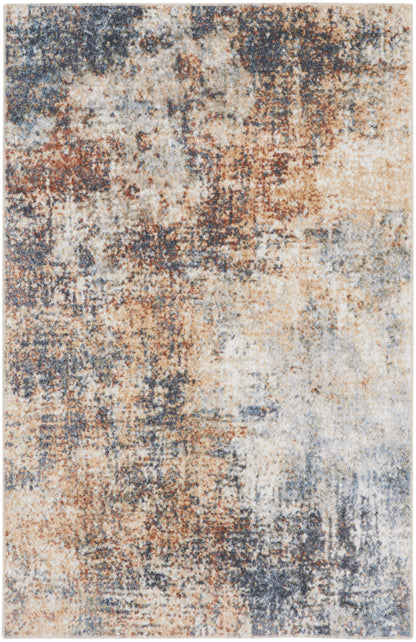 Abstract distressed area rug with blue, rust, and beige tones in a vintage, painterly pattern.