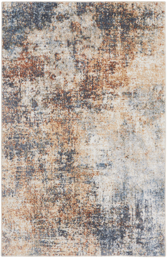 Abstract distressed area rug with blue, rust, and beige tones in a vintage, painterly pattern.
