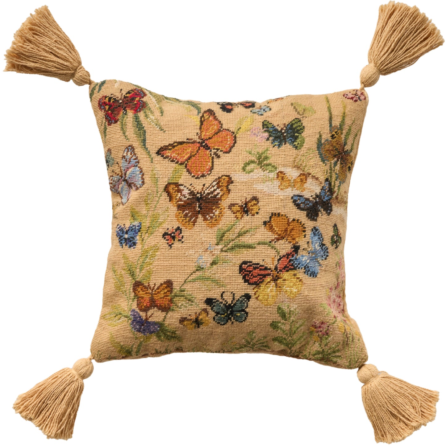 Beige square tapestry pillow with colorful butterfly embroidery and four tassels at each corner; decorative sofa accent.